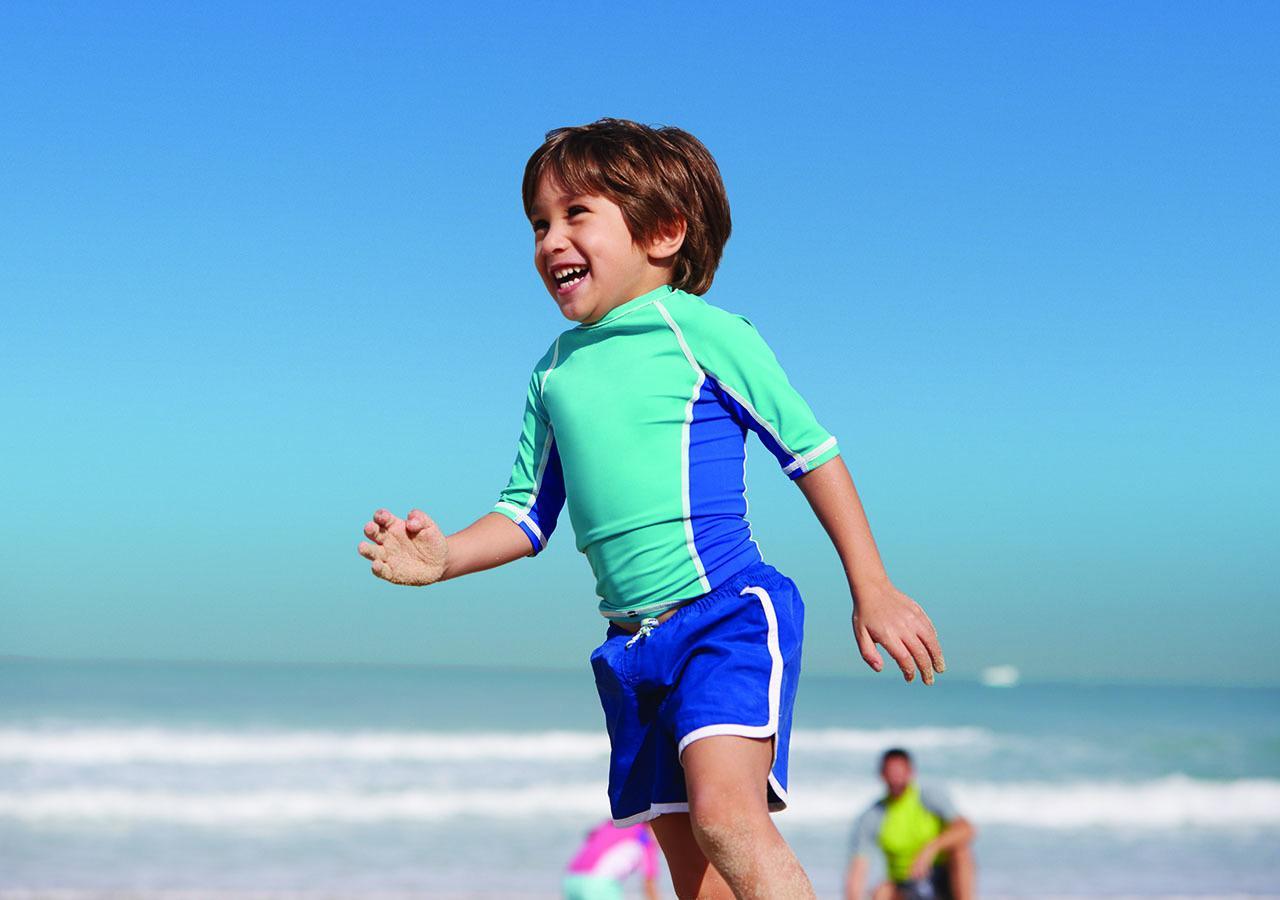Jumeirah Messilah Beach Kuwait Kuwait City Exterior photo A child wearing a rash vest